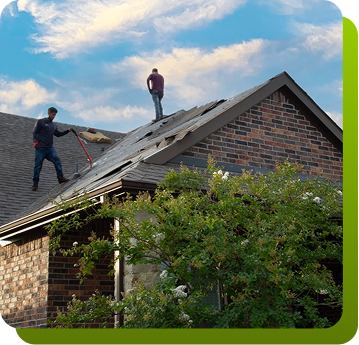 Principal Roofing workers repairing residential roof